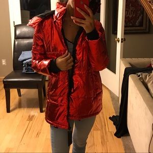 Oversized metallic red coat.